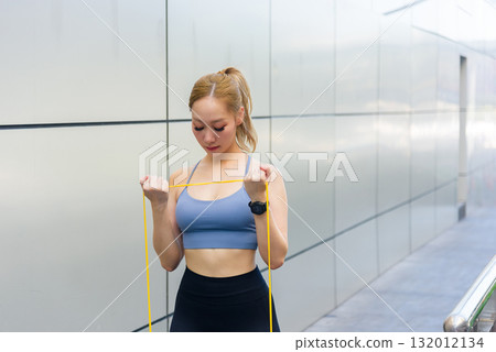 Workout for fit sport woman, outdoor exercise with resistance band builds strength, full body stretch improves flexibility, dedicated workout for people. 132012134