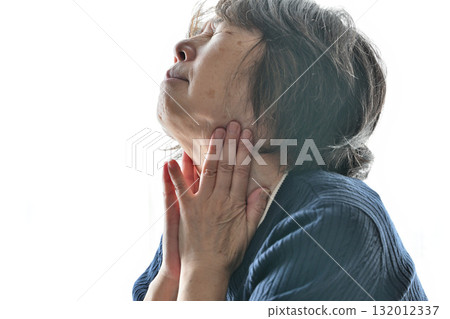 Senior woman concerned about her neck 132012337