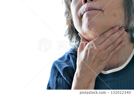 Senior woman concerned about her neck 132012340