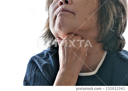 Senior woman concerned about her neck Senior woman concerned about her neck 132012341
