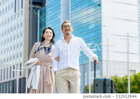 Men and women traveling Men and women traveling 132012644