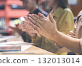 Teamwork and businesspeople in an office setting applaud for achievement or success. Collaboration, and a group of financial advisors applaud for goals, unity, or harmony. 132013014