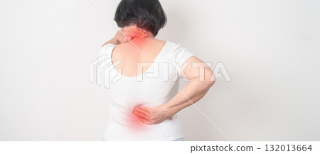 Elderly woman having back body ache for concepts of Back Muscle Strain, Piriformis Syndrome, Low Back Pain, Lumbar Disc Degeneration, Herniated, Osteoporosis, Spinal Compression and Health care Elderly woman having back body ache for concepts of Back Muscle Strain, Piriformis Syndrome, Low Back Pain, Lumbar Disc Degeneration, Herniated, Osteoporosis, Spinal Compression and Health care 132013664