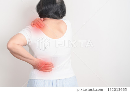 Elderly woman having back body ache for concepts of Back Muscle Strain, Piriformis Syndrome, Low Back Pain, Lumbar Disc Degeneration, Herniated, Osteoporosis, Spinal Compression and Health care Elderly woman having back body ache for concepts of Back Muscle Strain, Piriformis Syndrome, Low Back Pain, Lumbar Disc Degeneration, Herniated, Osteoporosis, Spinal Compression and Health care 132013665