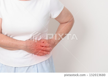 Elderly woman having side and Back Waist pain for Kidney disease, Urinary system and Stones, world Kidney and Cancer day, Chronic kidney, Organ Donor Day and Health care concept 132013680