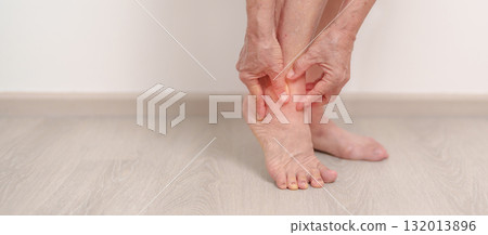 Elderly woman having leg pain due to Ankle Sprains or Achilles Tendonitis and Shin Splints ache. injury, hyperuricemia disease, Gout,Senior Health care and medical treatment concepts Elderly woman having leg pain due to Ankle Sprains or Achilles Tendonitis and Shin Splints ache. injury, hyperuricemia disease, Gout,Senior Health care and medical treatment concepts 132013896