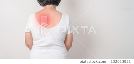 Business woman having back ache with Medicated pain relief patch plaster for Back Muscle Strain, Scapular Muscle Tightness, Piriformis Syndrome, Osteoporosis, Spinal Compression and Health care Business woman having back ache with Medicated pain relief patch plaster for Back Muscle Strain, Scapular Muscle Tightness, Piriformis Syndrome, Osteoporosis, Spinal Compression and Health care 132013931