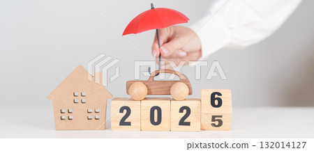 Happy New Year 2026 with red umbrella. Insurance, real estate, Home, car, loan, tax, investment, mortgage, financial, savings, protection and safety 132014127