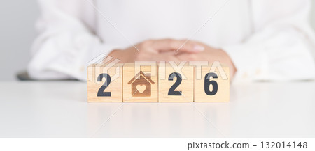 2026 with Home and Heart block. Property investment, House Mortgage, Real Estate tax, homeless, donation, Financial and happy family concepts 132014148