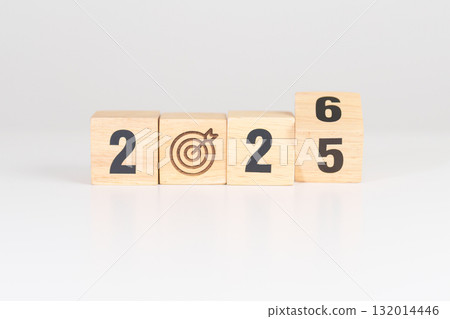 2025 year change to 2026 year block with dartboard icon. Goal, Target, Resolution, strategy, plan, Action, mission, motivation, and New Year start concepts 132014446