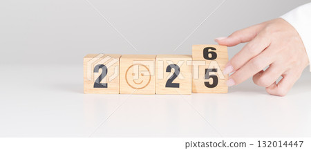 2025 end year to Happy New Year 2026 with Smile block. Satisfaction, feedback, Review, mental health, eco sustainable and good year concept 132014447