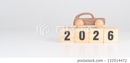 Happy New Year 2026 with Car model on table. Automobile Tax, Car Insurance, Financial, vehicle Repair and Maintenance and New Year concept 132014472
