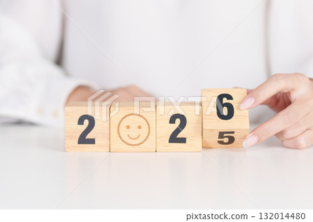 2025 end year to Happy New Year 2026 with Smile block. Satisfaction, feedback, Review, mental health, eco sustainable and good year concept 132014480