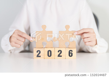 2026 year block with jigsaw puzzle icon. Business Process, Team, teamwork, Goal, mission, Resolution, strategy, plan, Action, partnership, and New Year start 132014487