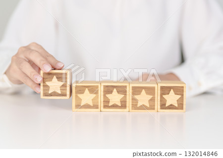 hand show Star block. Customer choose rating for user reviews. Service rating, ranking, customer review, satisfaction, evaluation and feedback concept hand show Star block. Customer choose rating for user reviews. Service rating, ranking, customer review, satisfaction, evaluation and feedback concept 132014846