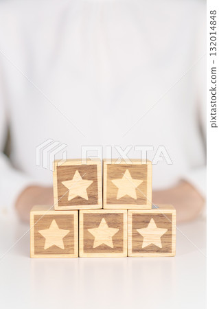 hand show Star block. Customer choose rating for user reviews. Service rating, ranking, customer review, satisfaction, evaluation and feedback concept hand show Star block. Customer choose rating for user reviews. Service rating, ranking, customer review, satisfaction, evaluation and feedback concept 132014848