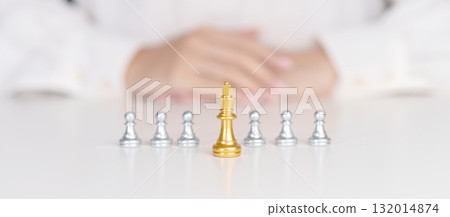 golden chess pawn pieces or leader businessman stand out of crowd people of silver men. leadership, business, team, teamwork and Human resource management concept 132014874