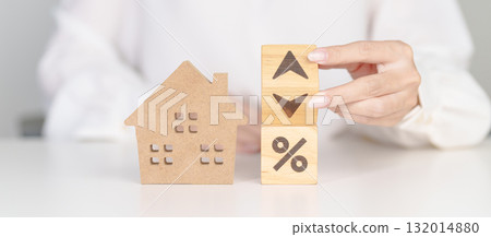 Percentage block change to UP and Down arrow with Home model. Real estate Mortgage, Refinance, House loan and debt, Interest rate, Insurance, Financial Property and economic recession Percentage block change to UP and Down arrow with Home model. Real estate Mortgage, Refinance, House loan and debt, Interest rate, Insurance, Financial Property and economic recession 132014880