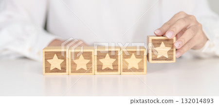 hand show Star block. Customer choose rating for user reviews. Service rating, ranking, customer review, satisfaction, evaluation and feedback concept 132014893
