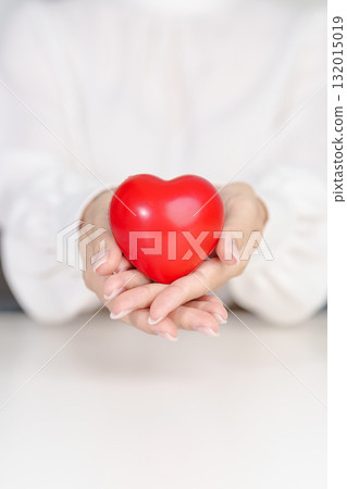 woman hand holding red heart shape. love, donor, September world heart day, world health day, CSR donation and Insurance concepts woman hand holding red heart shape. love, donor, September world heart day, world health day, CSR donation and Insurance concepts 132015019