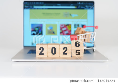 2025 end year to Happy New Year 2026 block with shopping trolley cart on table. E commerce, online shopping, finance, consumer economy and celebration concepts 2025 end year to Happy New Year 2026 block with shopping trolley cart on table. E commerce, online shopping, finance, consumer economy and celebration concepts 132015224