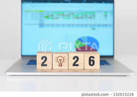 2026 Year block with lightbulb icon against computer laptop background. Business Idea, Creative, Thinking, brainstorm, Goal, Resolution, strategy, plan, Action, change and New Year start concepts 2026 Year block with lightbulb icon against computer laptop background. Business Idea, Creative, Thinking, brainstorm, Goal, Resolution, strategy, plan, Action, change and New Year start concepts 132015226