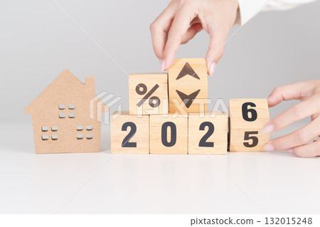 2026 New Year with percentage change to UP and Down arrow with Home model. Real estate Mortgage, Refinance, House loan and debt, Interest rate, Insurance, Financial and Property Tax 132015248