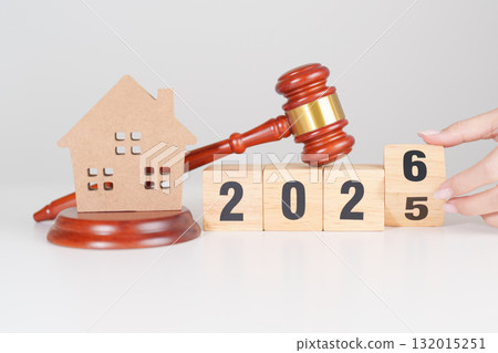 2025 end year to Happy New Year 2026 with small toy house model with gavel justice hammer on desk in courthouse. Real Estate Law, Home Insurance, property Tax, Auction and Bidding concepts 2025 end year to Happy New Year 2026 with small toy house model with gavel justice hammer on desk in courthouse. Real Estate Law, Home Insurance, property Tax, Auction and Bidding concepts 132015251