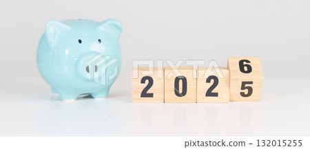 2025 end year to Happy New Year 2026 with piggy bank. Resolution, Goals, Plan, Action, Money Saving, Retirement fund, Pension, Investment and Financial concepts 132015255