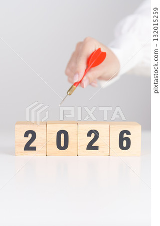 red dart with chess people and 2026 year blocks.. Goal, plan, action, target, strategy, leadership, New Year and marketing concept red dart with chess people and 2026 year blocks.. Goal, plan, action, target, strategy, leadership, New Year and marketing concept 132015259