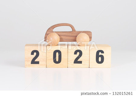 Happy New Year 2026 with Car model on table. Automobile Tax, Car Insurance, Financial, vehicle Repair and Maintenance and New Year concept 132015261