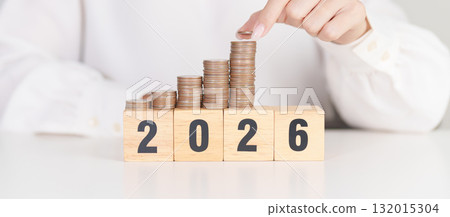 Happy New Year 2026 with Coins stack. Money, Budget, tax, investment, financial, savings and New Year Resolution concepts Happy New Year 2026 with Coins stack. Money, Budget, tax, investment, financial, savings and New Year Resolution concepts 132015304