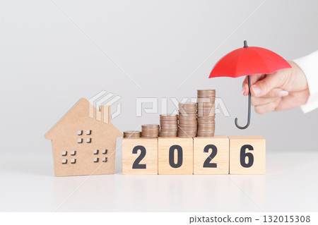 Happy New Year 2026 with red umbrella over money stack. Insurance, real estate, Home loan, tax, investment, mortgage, financial, savings, protection and safety Happy New Year 2026 with red umbrella over money stack. Insurance, real estate, Home loan, tax, investment, mortgage, financial, savings, protection and safety 132015308
