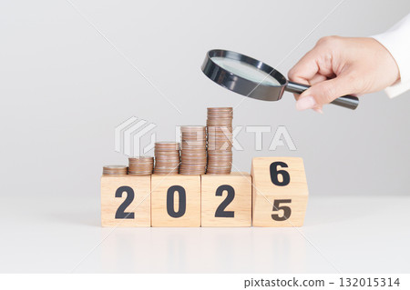 2025 end year to Happy New Year 2026 with coins money stack growing with magnifier glass. Money saving, Inflation, tax, cash flow, Job search, hiring and research development concepts 2025 end year to Happy New Year 2026 with coins money stack growing with magnifier glass. Money saving, Inflation, tax, cash flow, Job search, hiring and research development concepts 132015314