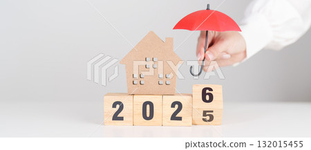 Happy New Year 2026 with red umbrella over money stack. Insurance, real estate, Home loan, tax, investment, mortgage, financial, savings, protection and safety Happy New Year 2026 with red umbrella over money stack. Insurance, real estate, Home loan, tax, investment, mortgage, financial, savings, protection and safety 132015455