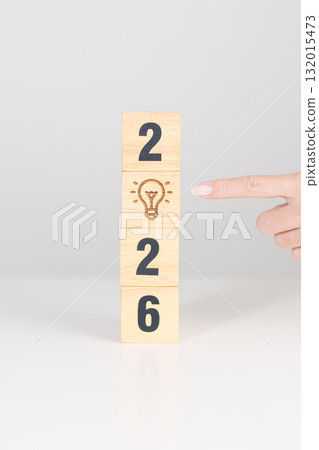 2026 year block with lightbulb. Business Idea, Creative, Thinking, brainstorm, Goal, Resolution, strategy, plan, Action, change and New Year start concepts 132015473