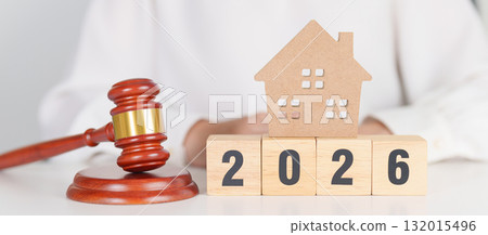 Happy New Year 2026 with small toy house model with gavel justice hammer on desk in courthouse. Real Estate Law, Home Insurance, property Tax, Auction and Bidding concepts Happy New Year 2026 with small toy house model with gavel justice hammer on desk in courthouse. Real Estate Law, Home Insurance, property Tax, Auction and Bidding concepts 132015496