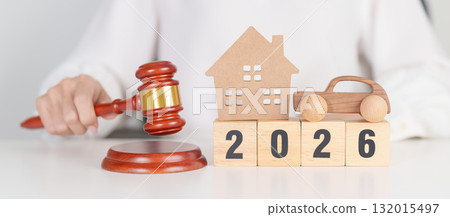 Happy New Year 2026 with house and Car model and gavel justice hammer on desk in courthouse. Real Estate and Car Law, Home Insurance, property Tax, Auction and Bidding concepts Happy New Year 2026 with house and Car model and gavel justice hammer on desk in courthouse. Real Estate and Car Law, Home Insurance, property Tax, Auction and Bidding concepts 132015497