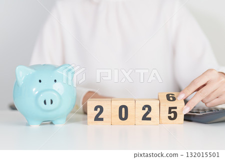 2025 end year to Happy New Year 2026 with piggy bank. Resolution, Goals, Plan, Action, Money Saving, Retirement fund, Pension, Investment and Financial concepts 132015501