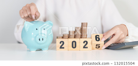 2025 end year to Happy New Year 2026 with piggy bank. Resolution, Goals, Plan, Action, Money Saving, Retirement fund, Pension, Investment and Financial concepts 132015504
