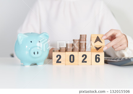 2026 New year with change to UP and Down arrow with coin stack. Interest rate, GDP, stocks market, financial, deflation and Inflation, mortgage, debt, Loan and Economic Recession 2026 New year with change to UP and Down arrow with coin stack. Interest rate, GDP, stocks market, financial, deflation and Inflation, mortgage, debt, Loan and Economic Recession 132015506