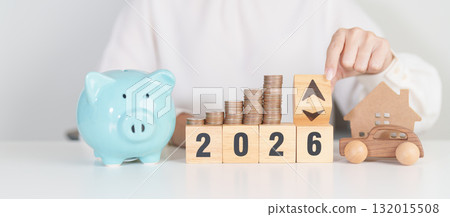 2026 New Year with percentage change to UP and Down arrow, car and Home model with coin stack. Car loan, Interest rate, real estate, house, Insurance, Financial, Repair, Tax, mortgage and Maintenance 132015508