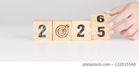 2025 year change to 2026 year block with dartboard icon. Goal, Target, Resolution, strategy, plan, Action, mission, motivation, and New Year start concepts 2025 year change to 2026 year block with dartboard icon. Goal, Target, Resolution, strategy, plan, Action, mission, motivation, and New Year start concepts 132015540