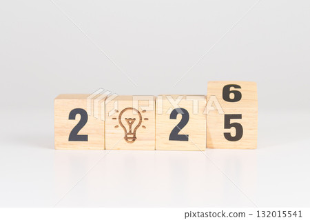 2025 year change to 2026 year block with lightbulb. Business Idea, Creative, Thinking, brainstorm, Goal, Resolution, strategy, plan, Action, change and New Year start concepts 2025 year change to 2026 year block with lightbulb. Business Idea, Creative, Thinking, brainstorm, Goal, Resolution, strategy, plan, Action, change and New Year start concepts 132015541