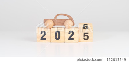 2025 end year to Happy New Year 2026 with Car model on table. Automobile Tax, Car Insurance, Financial, vehicle Repair and Maintenance and New Year concept 132015549
