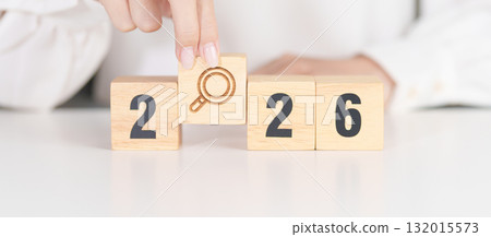 2026 year block with magnifying glass icon. SEO, Search Engine Optimization, hiring , Advertising, Idea, Strategy, marketing, Keyword, Content and New Year start concepts 132015573