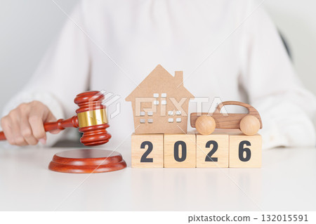 Happy New Year 2026 with house and Car model and gavel justice hammer on desk in courthouse. Real Estate and Car Law, Home Insurance, property Tax, Auction and Bidding concepts Happy New Year 2026 with house and Car model and gavel justice hammer on desk in courthouse. Real Estate and Car Law, Home Insurance, property Tax, Auction and Bidding concepts 132015591