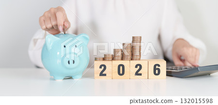 Happy New Year 2026 with piggy bank. Resolution, Goals, Plan, Action, Money Saving, Retirement fund, Pension, Investment and Financial concepts Happy New Year 2026 with piggy bank. Resolution, Goals, Plan, Action, Money Saving, Retirement fund, Pension, Investment and Financial concepts 132015598