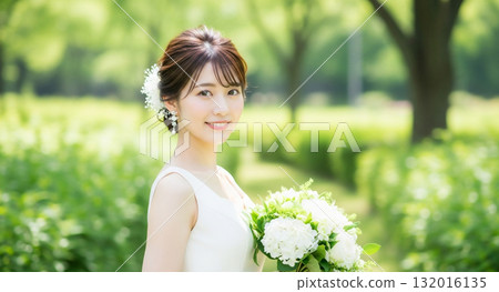 Portrait of a young woman in a wedding dress Portrait of a young woman in a wedding dress 132016135