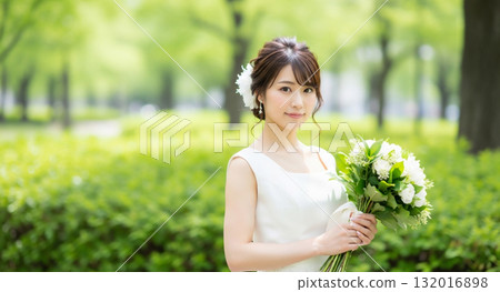 Portrait of a young woman in a wedding dress 132016898
